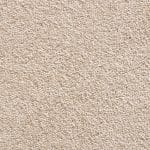 Beige plush carpet close-up showing soft textured fibers.